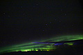 Big Dipper and Aurora Borealis out the airplane window